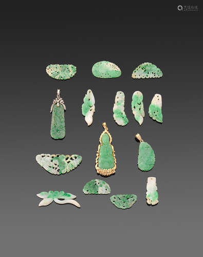 a group of fifteen carved jadeite decorations