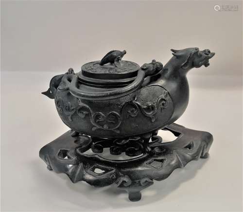 A Bronze Animal Head Teapot With Base