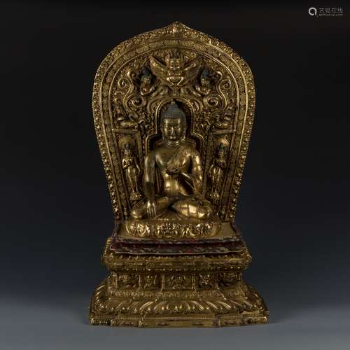 A Large Gilt Bronze Figure Of Buddha With Mandorla