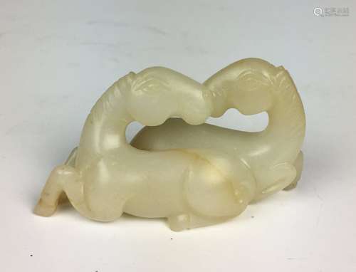 A Carved White Jade Horses