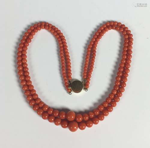 A Two Strand Coral Necklace With 14k YG Clasp