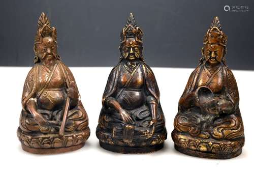 Three Tibetan Bronze Seated Lamas on Lotus Bases