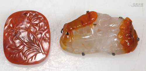 Two Chinese Qing Carved Agate or Jasper Pendants