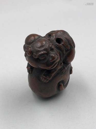 Chinese hardwood carving of a foo dog