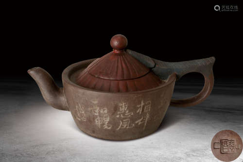 裴民石款紫砂蘭花紋茶壺