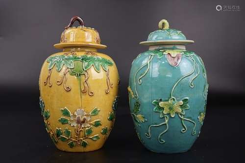 A Pair Of Carved Porcelain Jars