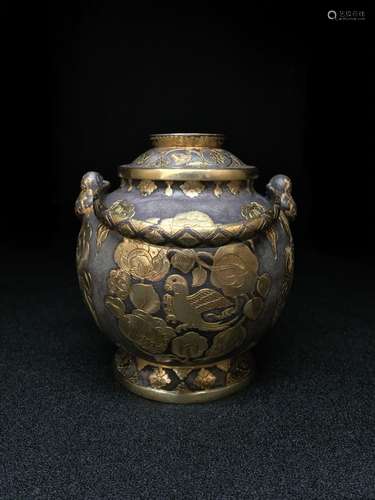 A Silver Jar With Lid