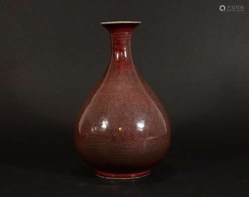 A Carved Red Glazed Vase