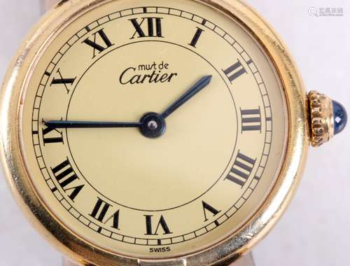 Cartier, Verguld 1e gehalte zilveren damespolshorloge met lederen band