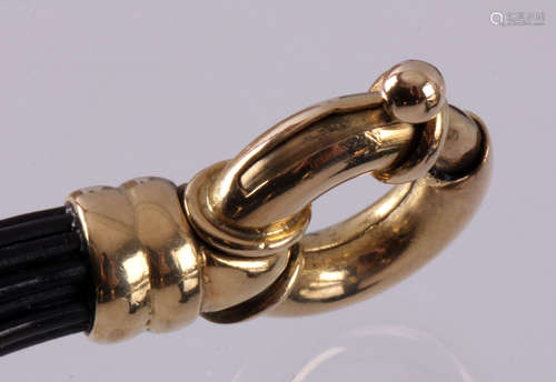 18 Kt. geelgouden armband met olifantenhaar, brutogewicht 24,2 gram, goudgewicht ca.18 gram, lengte ca.21 cm., winkelwaarde 2500,00