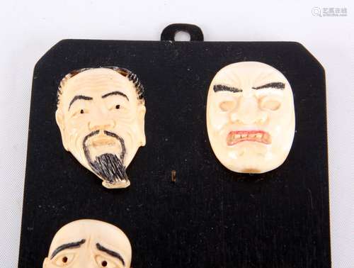 Koopje van 4 ivoren "Noh" maskers, gesigneerd, Japan circa 1900