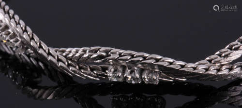14 Kt. witgouden armband met 9 briljant geslepen diamanten 0,50 ct.  kleur: Top Wit + kwaliteit piqué , 18 gram, lengte 19 cm, winkelwaarde 2500,00