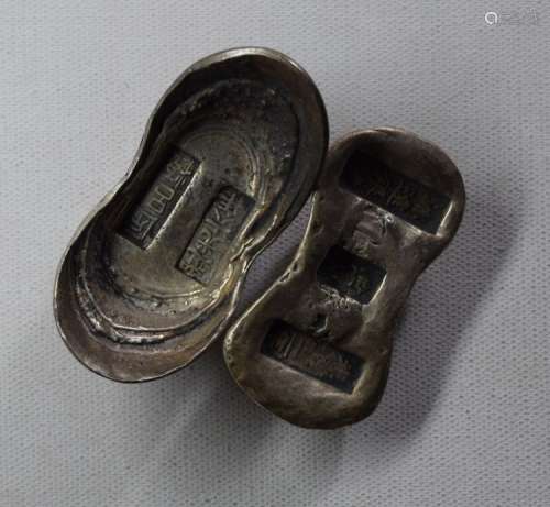 TWO CHINESE SILVER INGOTS