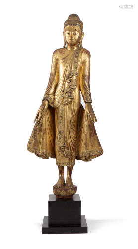 Birmanie, 2ème moitié XIXe siècle  Statuette en bois laqué et doré, représentant le Bouddha souriant