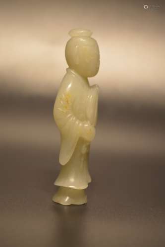 Carved white jade of a maid
