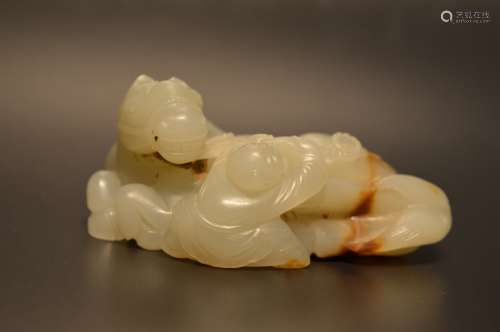 Carved white and russet jade depicting horse & boy
