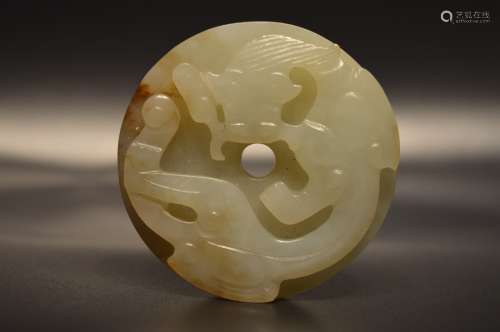 Carved white jade dragon disc