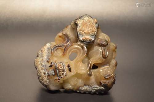 Unearthed carved jade lions