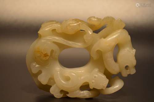 finely carved white jade and russet dragons