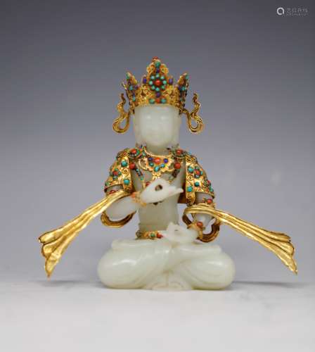Jade buddha with decorative jewels, gold with silver