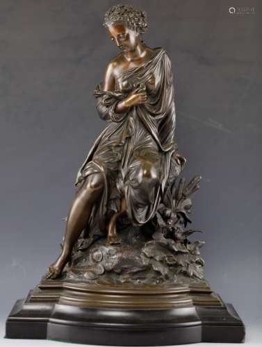 Western female bronze statue