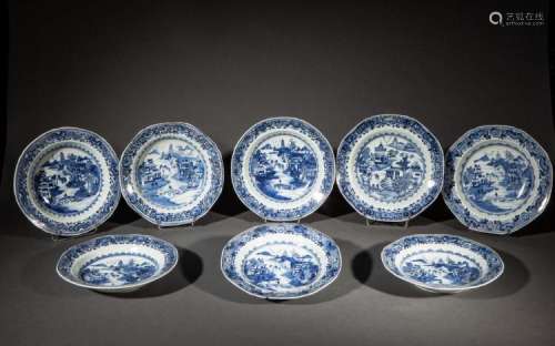 Suite de 6 assiettes en porcelaine blanche décorée en bleu cobalt sous couverte d'un paysage lacustre.