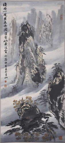 Scroll painting of trees in a rocky landscape