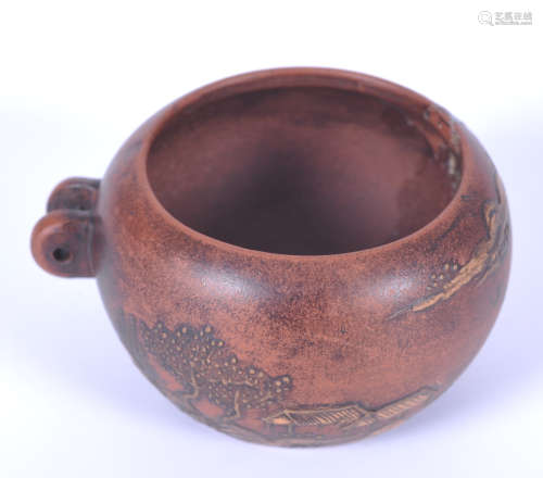 Small red pottery vessel