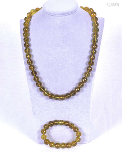 Amber round beaded necklace together with a bracelet