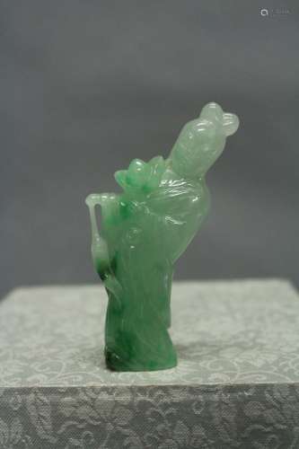 A Carved Jadeite Figure