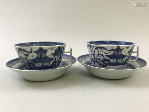 A Pair of Blue and Wite Cups with Dishes