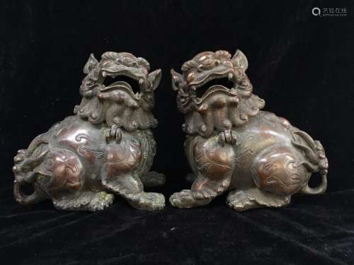 Pair of Chinese Bronze Seating Lions