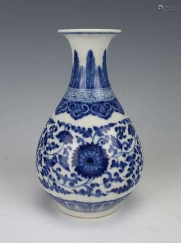 SMALL BLUE AND WHITE VASE