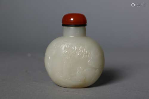 A Chinese carved white jade 'boating' snuff bottle