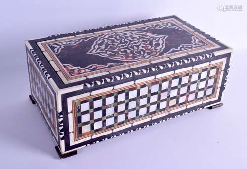 AN UNUSUAL TURKISH OTTOMAN CARVED BONE TORTOISESHELL AND MOTHER OF PEARL CASKET with sliding top,