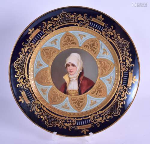 AN EARLY 20TH CENTURY AUSTRIAN VIENNA PORCELAIN PLATE painted with a central portrait of a female