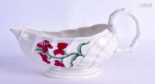 Mid 18th c. Chantilly rare moulded sauceboat painted with two specimen plants and a butterfly,