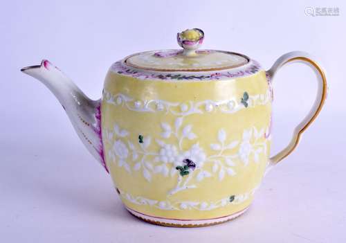 Worcester floral moulded teapot and cover with lemon coloured ground, the border with puce