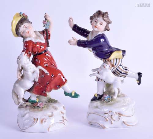 A PAIR OF LATE 19TH CENTURY CONTINENTAL PORCELAIN FIGURES modelled as a boy and girl beside