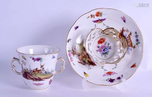 Late 18th/early 19th c. Berlin two handled chocolate and trembleuse saucer painted with hunting