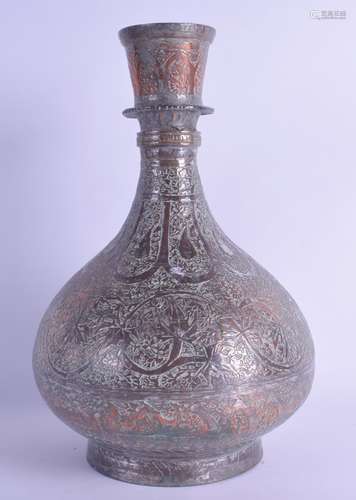 AN 18TH/19TH CENTURY MIDDLE EASTERN TINNED COPPER VASE decorated with flowers and trailing vines. 28