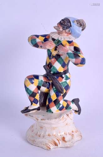 Late 18th c. Cozzi pottery figure of a Harlequin knelling on one knee. 13.5 cm high.