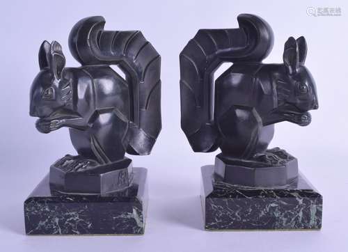 A STYLISH PAIR OF ART DECO BRONZE FIGURES OF SQUIRRELS by Max LeVerrier, modelled upon marble