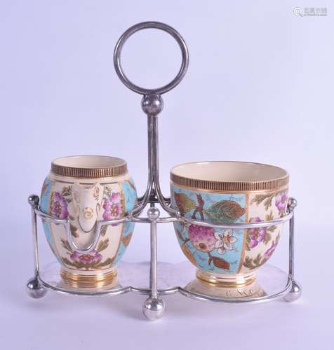 A LATE 19TH CENTURY AESTHETIC MOVEMENT TEXTURED POTTERY MILK JUG AND SUGAR BASIN within a silver