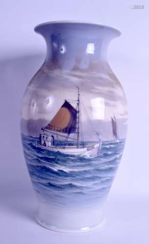 A LARGE ROYAL COPENHAGEN BALUSTER VASE painted with boats at sea. 33.5 cm high.