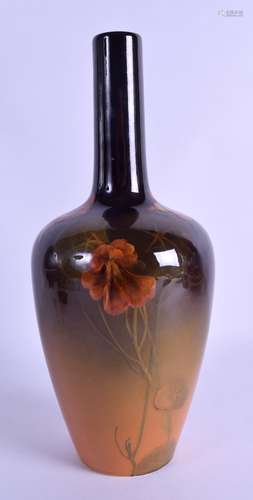 A GOOD AMERICAN ROOKWOOD POTTERY VASE decorated with stylised flowers and vines. 27 cm high.