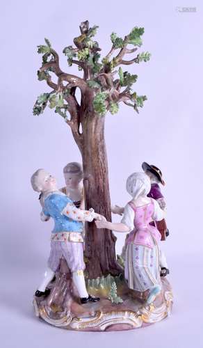 A 19TH CENTURY GERMAN MEISSEN PORCELAIN FIGURAL GROUP depicting four figures dancing around a