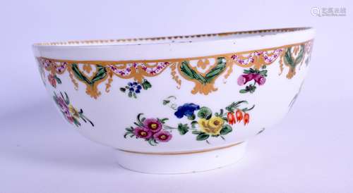 Bristol bowl painted with flower and an elaborate green and gold border. 15.5 cm wide.