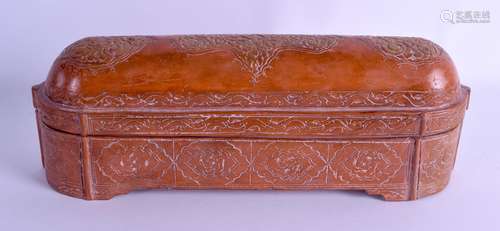 AN UNUSUAL TURKISH OTTOMAN TERRACOTTA PEN BOX of oval form, highlighted in gilt foliage and