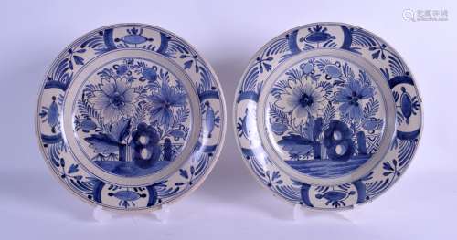 A PAIR OF 18TH/19TH CENTURY DUTCH DELFT BLUE AND WHITE DISHES painted with landscapes. 23 cm